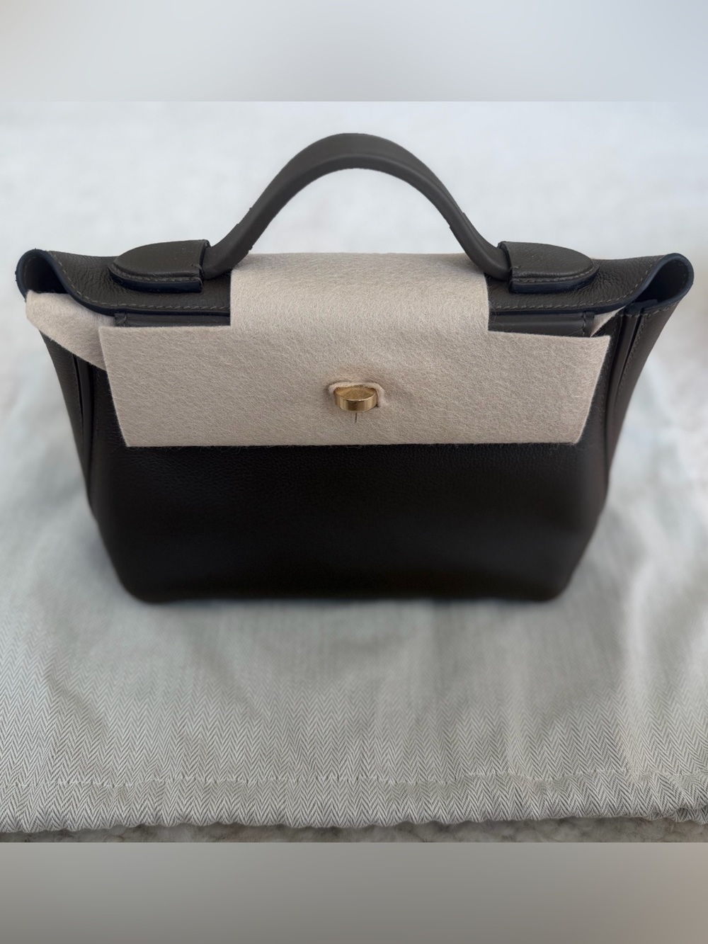 Hermes 24/24 in size 21. Vert Loden.